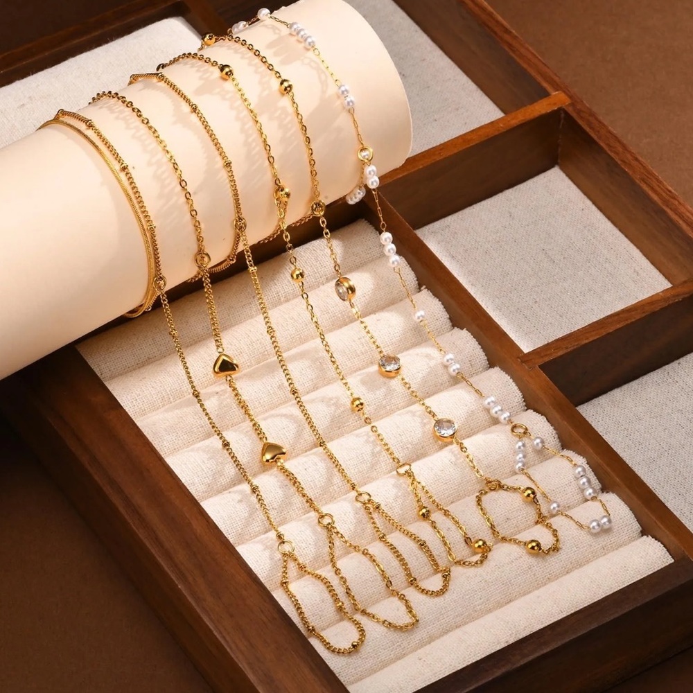 Elegant Gold and Pearl Women's Hand Chains